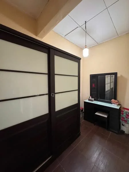 Room features: wooden sliding doors, vanity table with mirror, light fixture, cream painted walls, brown tiled flooring, decorative items on vanity, wall-mounted mirror, suspended ceiling; style: modern.