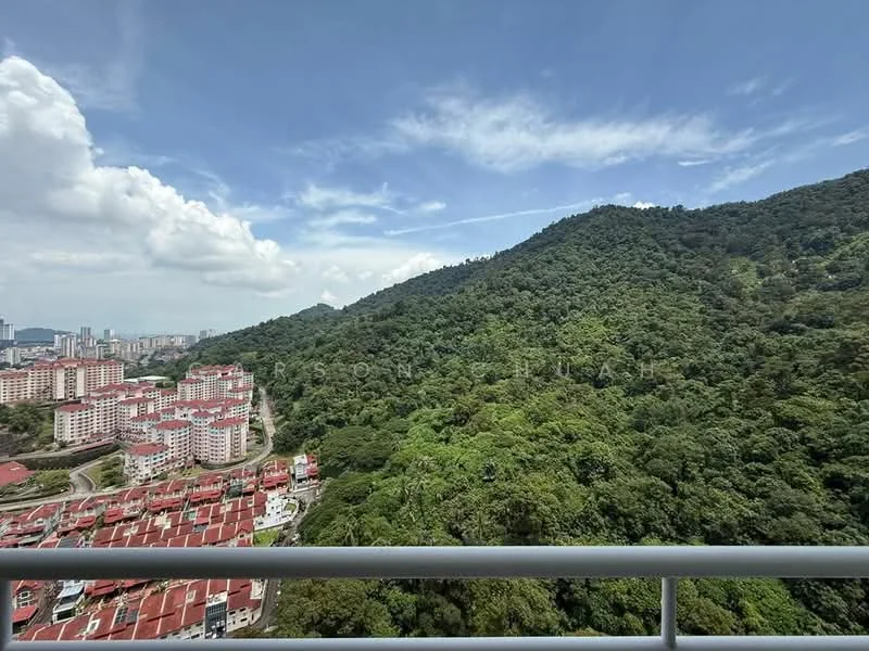 Exterior type: high-rise condominium; features: mountain view, surrounded by greenery, urban skyline in background, multiple residential buildings in foreground, balcony railing visible; style: modern.