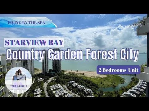 Exterior type: high-rise condominium; features: sea view, city skyline in background, balconies visible, surrounded by greenery, modern architectural design, swimming pool visible in foreground, manicured landscaping, multi-storey buildings, beachfront access; style: modern.