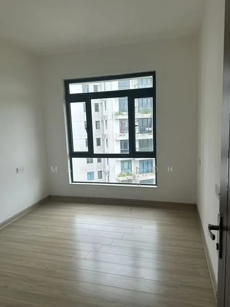 Room features: white painted walls, light wood flooring, large window with black frame, view of adjacent building, no visible furniture, neutral color scheme, single light switch, baseboard trim; style: modern; view: city.