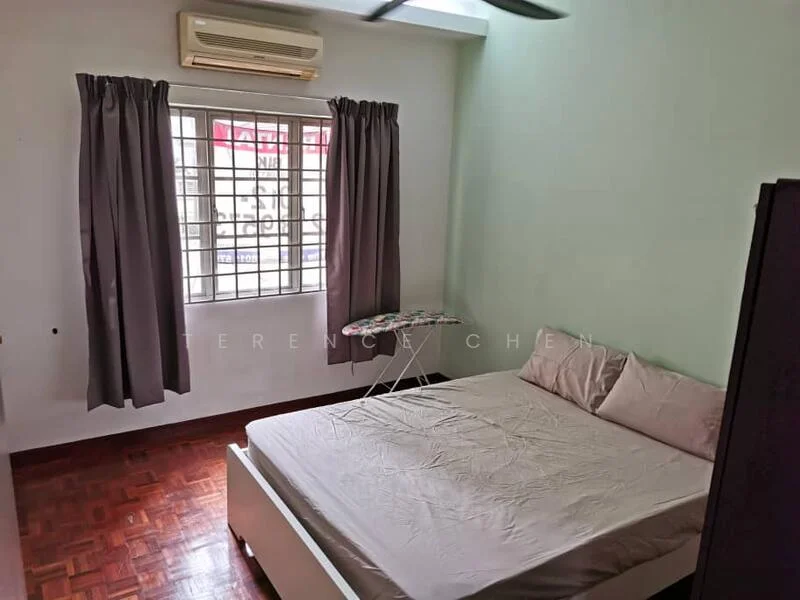 Bedroom features: queen-size bed, light grey bedding, wooden flooring, green painted walls, floor-to-ceiling window, grey curtains, air conditioning unit, ceiling fan, ironing board, white bed frame.