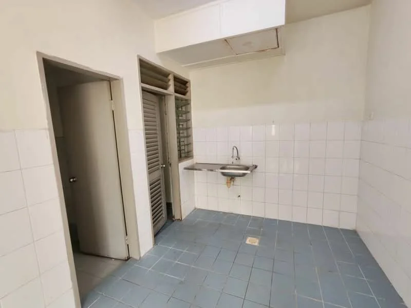 Laundry features: grey tiled flooring, white tiled walls, single-bowl stainless-steel sink, wall-mounted faucet, built-in cabinetry, window for natural light, floor drain, open layout.