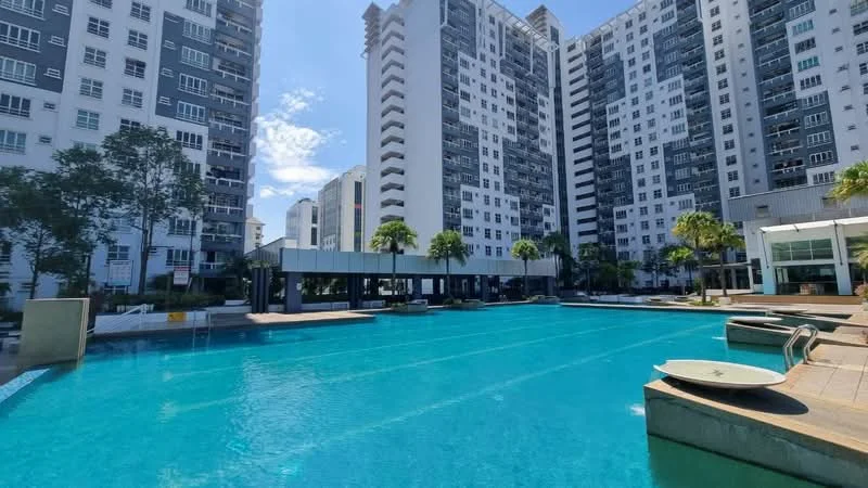 Exterior type: high-rise condominium; features: infinity pool, pool deck with loungers, surrounded by palm trees, modern architecture, glass curtain wall, manicured landscaping, multiple residential towers, outdoor seating area; style: modern.