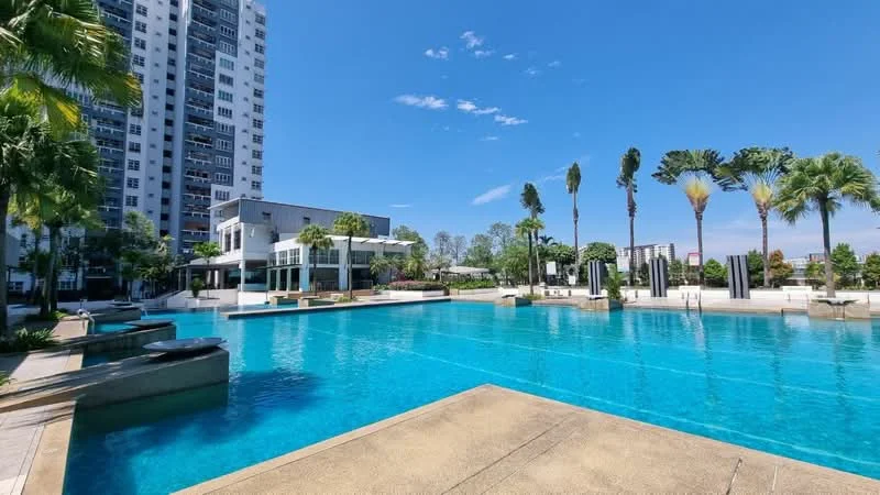 Exterior type: high-rise condominium; features: infinity pool, pool deck with loungers, landscaped garden, palm trees, manicured lawn, modern clubhouse, surrounded by greenery, clear blue sky; style: modern.