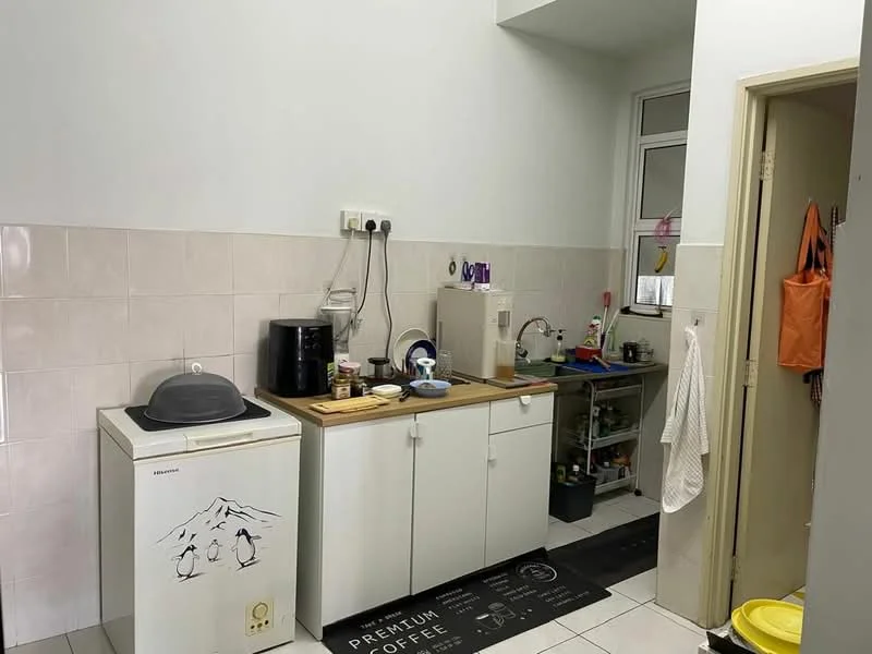 Kitchen features: white tiled walls, white cabinetry, black countertop, stainless-steel sink, single-bowl sink, chrome faucet, built-in microwave, electric kettle, coffee machine, refrigerator, kitchen mat with text, open shelving, floor tiles, wall-mounted hooks for utensils; style: modern.