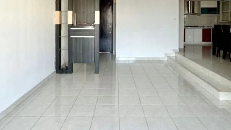 Room features: white painted walls, glossy ceramic tile flooring, open layout, steps leading to another area, doorway, kitchen area visible in background, dining area visible in background, natural light from windows; style: modern.