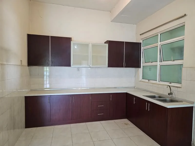 Kitchen features: brown wooden cabinetry, white countertop, double-bowl stainless-steel sink, chrome pull-down faucet, white tiled backsplash, white tiled flooring, large window with multiple panes, under-cabinet lighting; style: modern.