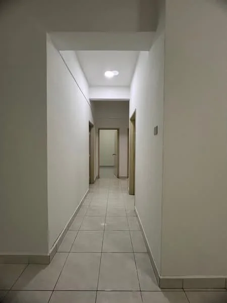 Hallway features: white painted walls, tile flooring, recessed ceiling lights, doorways with wooden frames, neutral color scheme, straight corridor layout; style: modern.