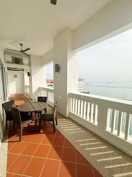 Balcony features: outdoor dining table, four wicker chairs, ceiling fan, terracotta tile flooring, white painted walls, railings with vertical balusters, view of the sea, overhead light fixtures; style: modern; view: sea.