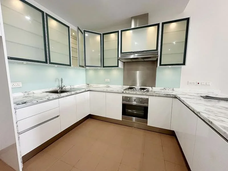 Kitchen features: marble countertop, white cabinetry with glass-front upper cabinets, stainless-steel built-in oven, stainless-steel gas hob, stainless-steel range hood, single-bowl stainless-steel sink, chrome pull-down faucet, light blue backsplash, under-cabinet lighting, tile flooring in beige; style: modern.