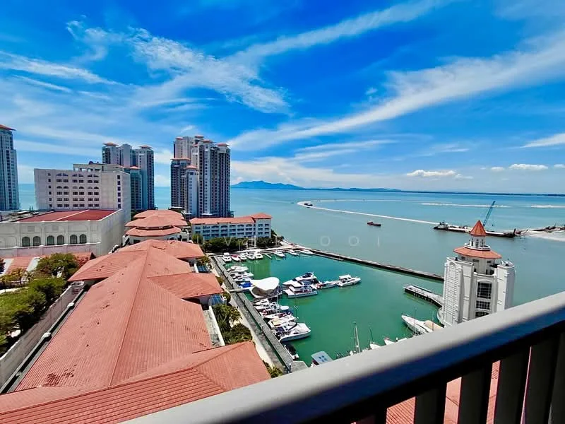 Exterior type: high-rise condominium; features: waterfront view, marina with boats, red tiled roofs, surrounding high-rise buildings, clear blue sky, sea view, landscape with greenery; style: modern.