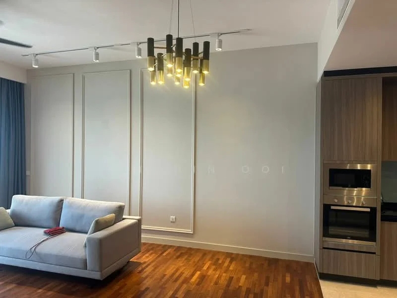 Living features: 3-seater fabric sofa in light grey, wooden flooring, chandelier with multiple bulbs, recessed downlights, wall with decorative paneling, large window with curtains, built-in cabinetry with oven and microwave, open layout to kitchen, neutral wall color; style: modern.