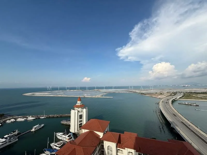 Exterior features: waterfront view, marina with yachts, coastal road, blue sky, clouds, landscape with landform, building with red roof, tower structure, paved road; style: modern.