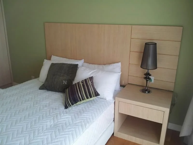 Bedroom features: queen-size bed, upholstered headboard, white bedding, decorative pillows, nightstand with drawer, table lamp, light green painted walls, wooden flooring; style: modern.