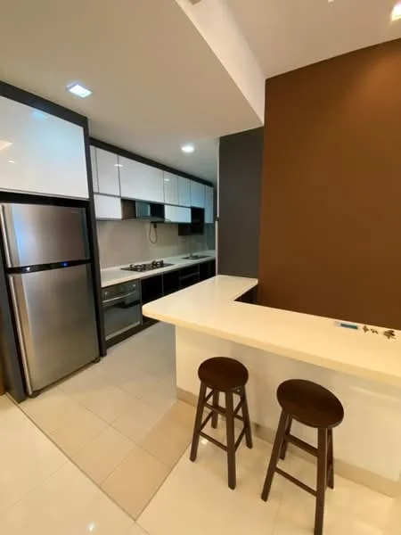 Kitchen features: stainless-steel fridge, built-in oven, 4-burner gas hob, white quartz countertop, white cabinetry with flat-panel design, black cabinetry, tile backsplash, bar counter with seating for 2, pendant lighting, recessed downlights, cream ceramic tile flooring, brown accent wall; style: modern.