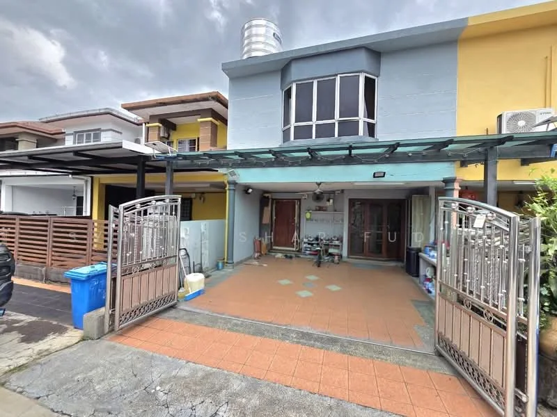 Exterior type: linked terrace house; features: two-storey building, grey painted facade, yellow accent wall, metal gate, car porch with awning, water tank on roof, paved walkway, outdoor seating area, front garden with plants, visible air conditioning unit; style: modern.