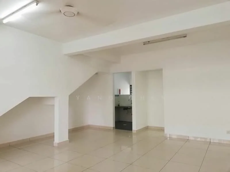 Room features: white painted walls, tile flooring, ceiling with fluorescent lighting, staircase leading to upper level, open layout, corner with sink and countertop, neutral color scheme, no visible furniture; style: modern.
