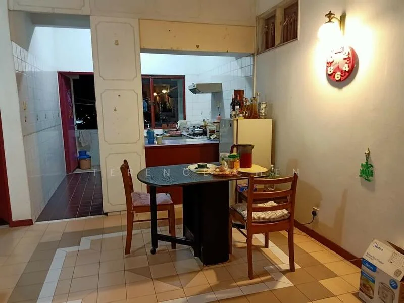 Dining features: square dining table, 2 wooden dining chairs, wall-mounted clock, light fixture on wall, tile flooring in beige and cream, open layout to kitchen, window with view to outside, decorative wall art, white painted walls, kitchen area visible in background. Kitchen features: kitchen counter with cabinets, stainless-steel sink, gas stove, exhaust hood, tile backsplash, multiple kitchen appliances visible, open shelving, white tiled walls, floor tiles in dark color.