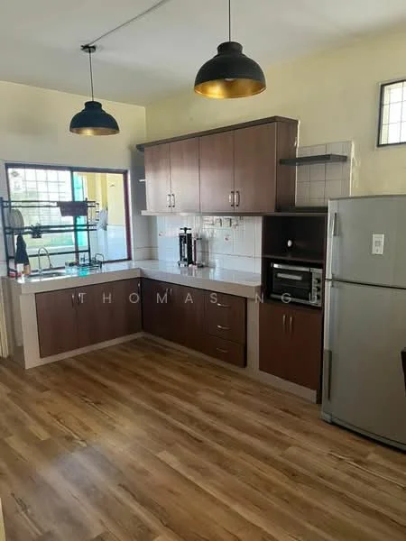 Kitchen features: brown wooden cabinetry, white tiled backsplash, stainless-steel refrigerator, built-in microwave, countertop with breakfast bar, single-bowl stainless-steel sink, chrome pull-down faucet, pendant lighting, laminate flooring, window with grid pattern, open layout to living area; style: modern.