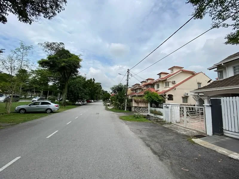 Exterior type: linked terrace house; features: two-storey linked terrace houses, red tiled roofs, white painted facade, manicured lawns, paved driveway, surrounded by mature trees, street view with parked cars, power lines visible; style: modern.