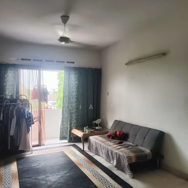 Living features: 3-blade ceiling fan, floor-to-ceiling sliding glass door, curtains, sofa, coffee table, area rug with geometric pattern, wall-mounted light fixture, clothing rack, decorative throw pillows.
