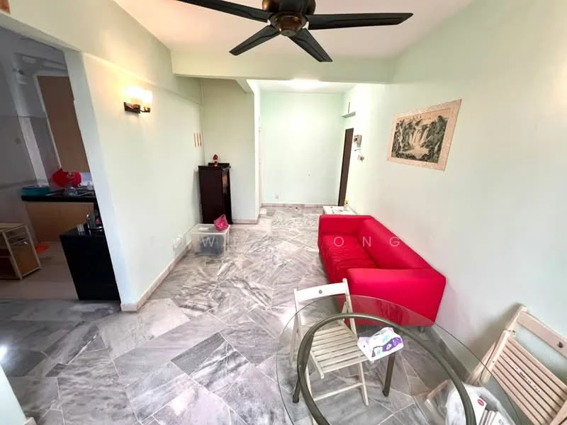 Living features: light green painted walls, marble flooring, 5-blade ceiling fan, red fabric sofa, glass dining table, white dining chairs, decorative wall art, natural light from windows; style: modern.