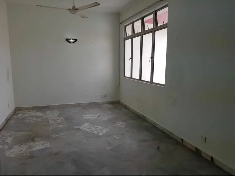 Room features: white painted walls, marble flooring, ceiling fan, 3 windows, light fixture on wall.