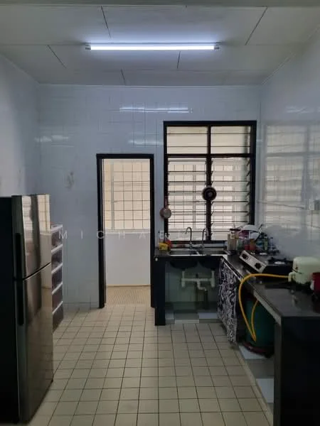 Kitchen features: white tiled walls, cream tiled flooring, stainless-steel fridge, double-bowl stainless-steel sink, chrome pull-down faucet, black countertop, built-in cabinets, window with black metal grille, kitchen appliances, light fixture on ceiling.