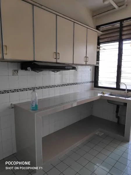 Kitchen features: white tiled walls, grey countertop, single-bowl stainless-steel sink, chrome pull-down faucet, upper cabinetry with cream doors, window with horizontal blinds, white tiled flooring, wall-mounted range hood.