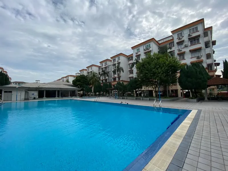 Exterior type: low-rise apartment block; features: swimming pool, pool deck with loungers, landscaped garden, palm trees, manicured lawn, covered pavilion, multiple storeys, balconies on upper floors; style: modern.