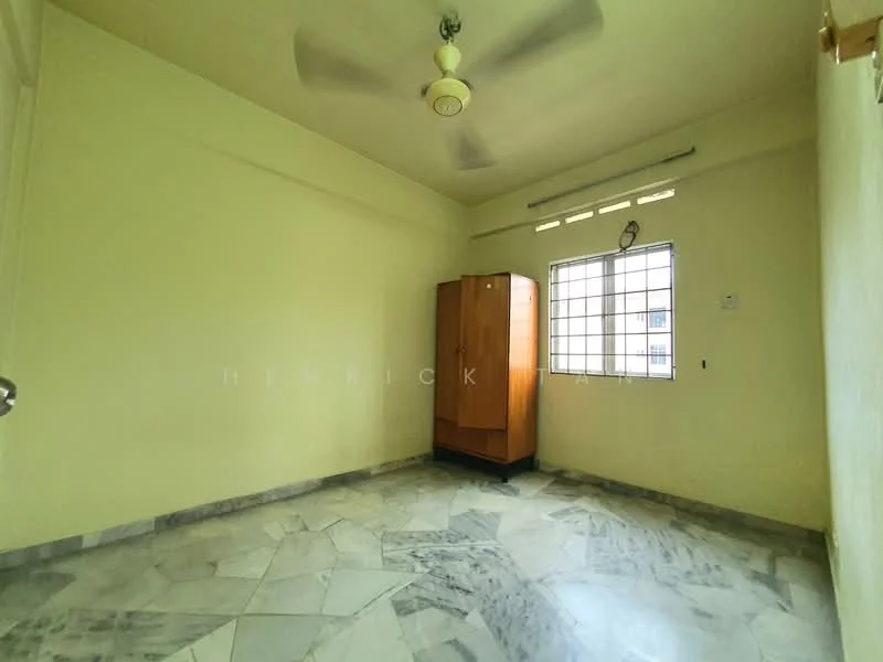 Room features: marble flooring, cream painted walls, ceiling fan, single window, wooden wardrobe, light switch, power outlet.