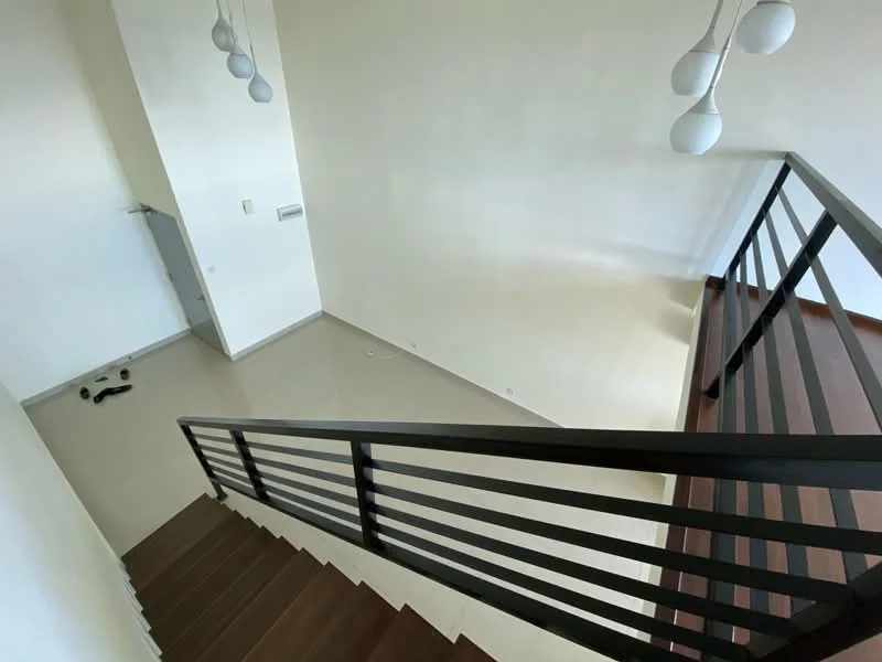 Room features: staircase with wooden steps, metal railing, white painted walls, recessed lighting, pendant lights, glossy tile flooring, corner wall with electrical outlet, open space layout; style: modern.