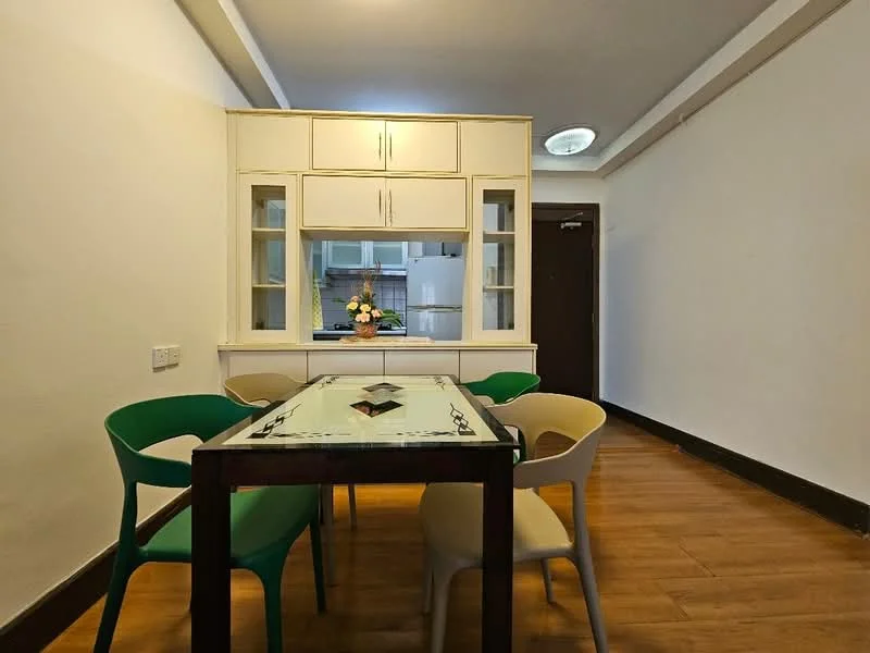 Dining features: wooden dining table, 6 dining chairs in various colors, white cabinetry with glass doors, laminate flooring, neutral painted walls, ceiling light fixture, window with view to outdoor area; style: modern.