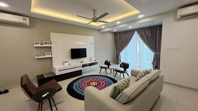Living features: sofa in light grey fabric, coffee table, area rug with circular pattern, wall-mounted TV, white entertainment unit, 2 accent chairs, 5-blade ceiling fan with light, recessed LED downlights, floor-to-ceiling windows with sheer curtains, cream painted walls, light grey accent wall, tile flooring; style: modern; view: city.