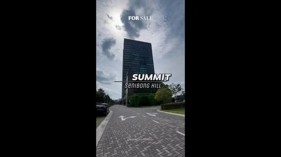 Exterior type: high-rise condominium; features: glass curtain wall, approximately 10-storey high-rise, manicured landscaping, paved driveway, surrounded by greenery, visible parking spaces; style: modern.