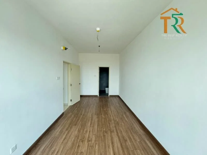 Room features: white painted walls, laminate flooring, single ceiling light fixture, doorway leading to another room, doorway leading to bathroom, no visible windows, neutral color scheme; style: modern.