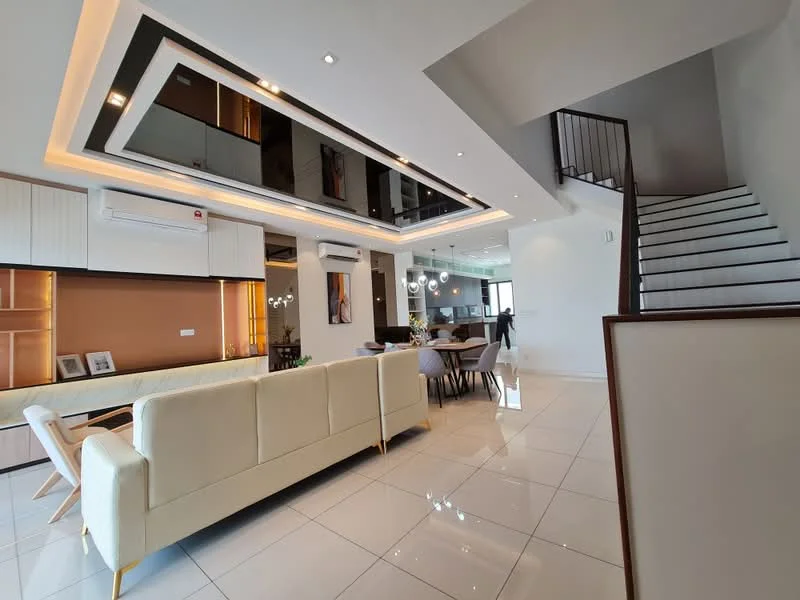 Living features: cream fabric sofa, white glossy tile flooring, recessed LED downlights, tray ceiling with cove lighting, wall-mounted air conditioning unit, large mirror above the sofa, decorative wall paneling, open-plan layout to dining area, staircase with wooden handrail, large windows for natural light; style: modern. Dining features: round dining table, upholstered dining chairs, pendant lighting above dining table; style: modern.