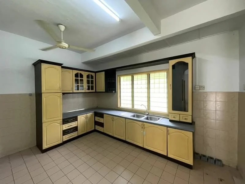 Kitchen features: yellow cabinetry with glass-front upper cabinets, grey countertop, double-bowl stainless-steel sink, chrome faucet, wall-mounted ceiling fan, tile backsplash, cream tiled walls, beige tiled flooring, window with grid pattern, built-in oven, kitchen drawers, kitchen cabinets; style: traditional.