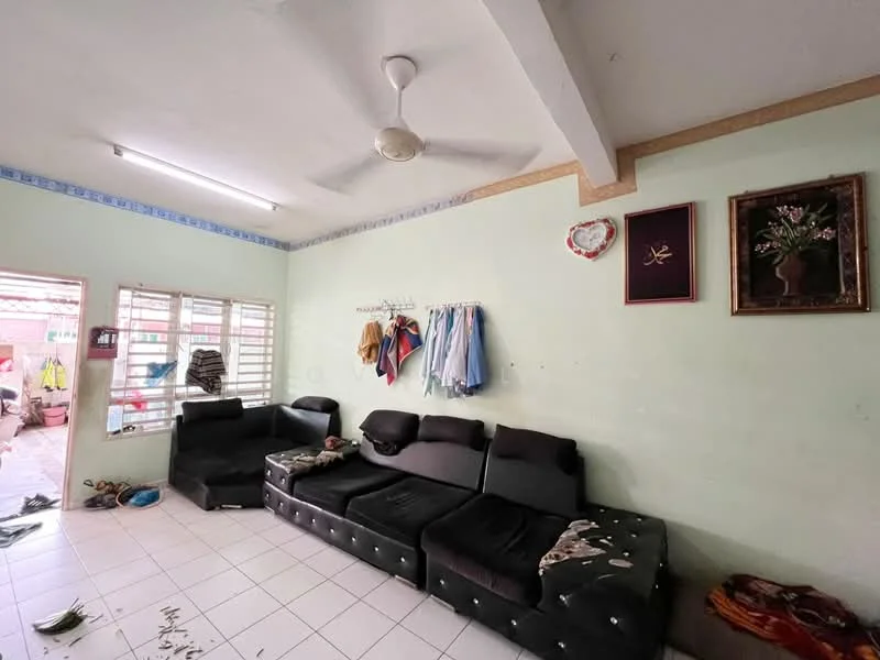 Living features: black fabric sectional sofa, white tiled flooring, light green painted walls, ceiling fan, wall-mounted artwork, window with horizontal slats, decorative wall clock, hanging coat rack.
