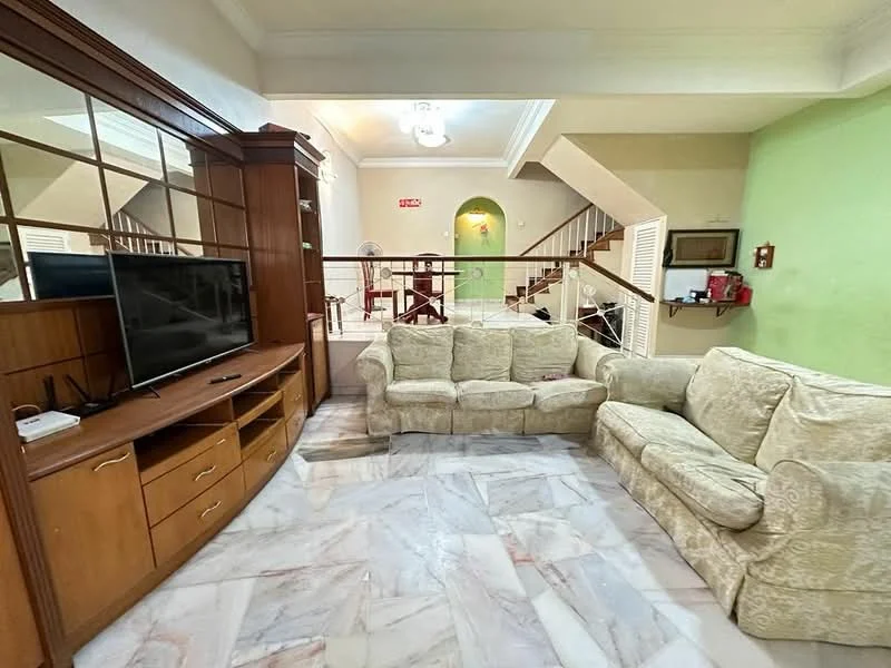 Living features: 3-seater fabric sofa in light beige, 2-seater fabric sofa in light beige, wooden TV console, flat-screen TV, marble flooring, decorative wall mirror, ceiling light fixture, staircase leading to upper floor, green accent wall, wooden railing, built-in shelving unit; style: contemporary.