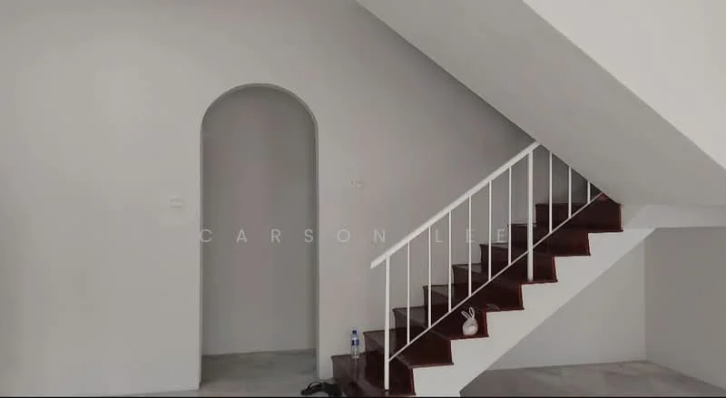 Room features: white painted walls, grey tiled flooring, staircase with wooden steps, metal railing, arched doorway, water bottle on the floor, minimalist decor; style: modern.