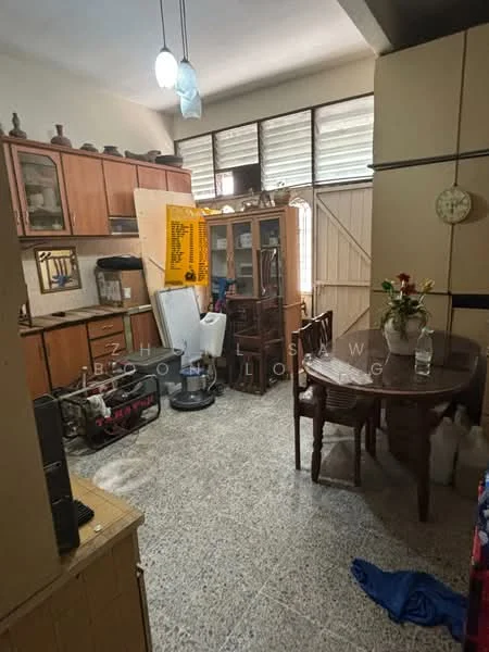 Kitchen features: wood cabinetry, granite countertop, stainless-steel sink, freestanding refrigerator, built-in oven, dining table with chairs, ceramic tile flooring, window with blinds, light fixtures, decorative items on shelves; style: traditional.