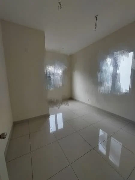 Room features: cream painted walls, glossy ceramic tile flooring, two windows, unfurnished, no visible ceiling fixtures, natural light from windows.