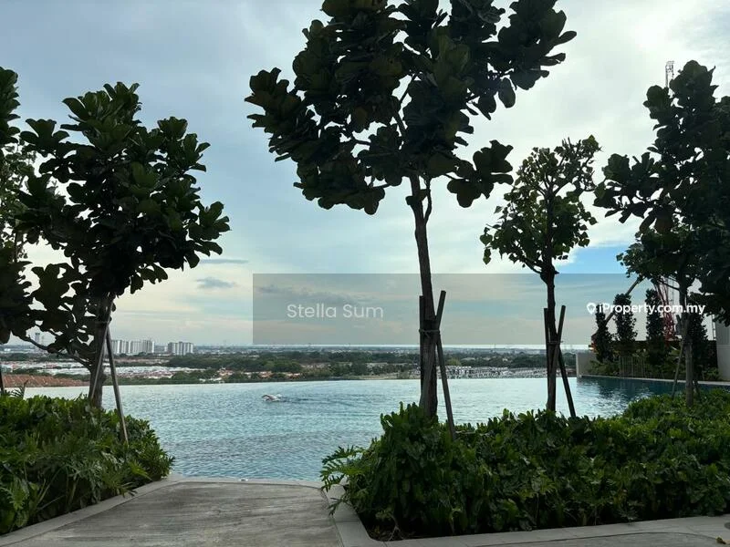 Exterior type: swimming pool deck; features: infinity pool, landscaping with trees, manicured greenery, city skyline view, pool deck with loungers, surrounding greenery; style: modern.