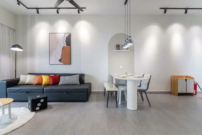 Living features: 3-seater fabric sofa in grey, decorative cushions in various colors, round coffee table with wooden top, area rug with circular shape, floor lamp with black shade, ceiling fan with light, wall-mounted artwork, white walls with recessed lighting, grey tile flooring, dining table with white base and round top, 4 dining chairs in white, wooden side cabinet; style: modern.