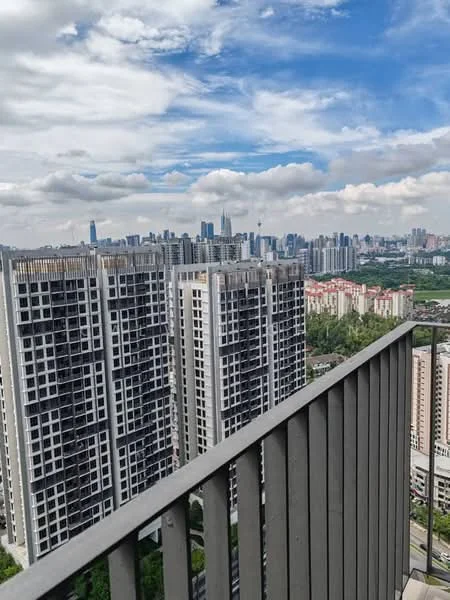 Exterior type: high-rise condominium; features: glass curtain wall, recessed balconies, approximately 20-storey high-rise, surrounded by mature greenery, city skyline view in background; style: modern.