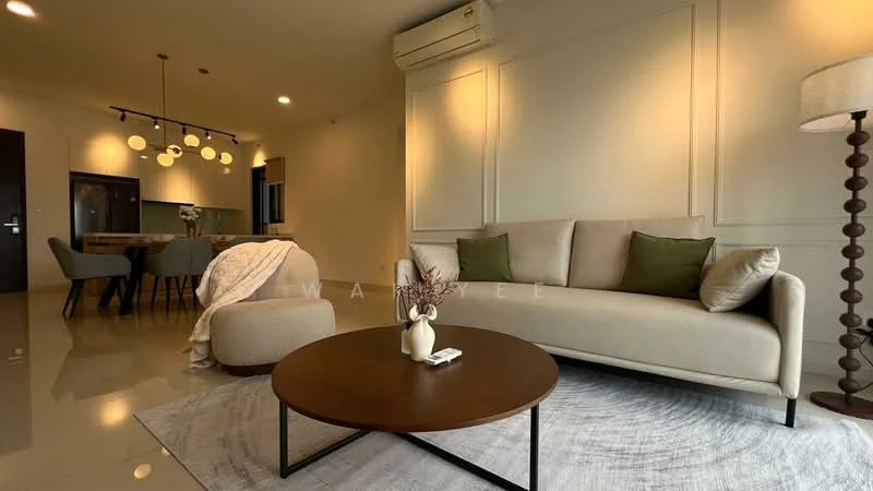 Living features: 3-seater fabric sofa in beige, green decorative cushions, round coffee table with dark wood top, area rug with circular pattern, wall-mounted air conditioning unit, recessed ceiling lights, decorative floor lamp, wall paneling, large windows with natural light; style: modern. Dining features: 6-seater dining table, grey upholstered dining chairs, pendant lighting above dining table, open layout connecting to living area; style: modern.