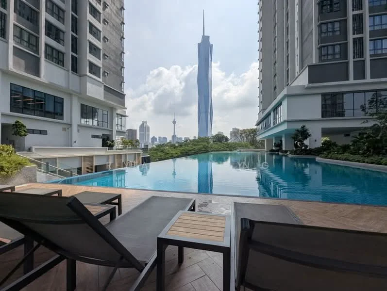 Exterior type: high-rise condominium; features: infinity pool, pool deck with loungers, landscaped garden, surrounded by mature greenery, city skyline view, glass curtain wall facade, recessed balconies, feature lighting at night; style: modern.