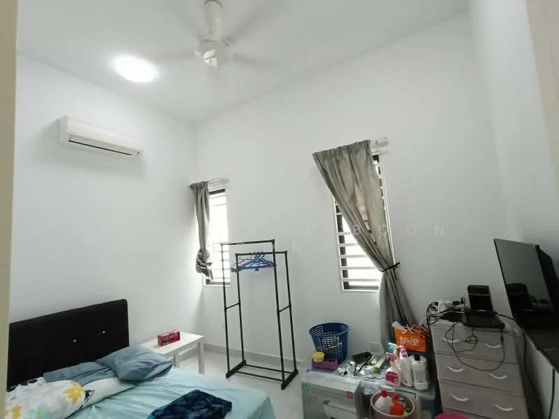 Bedroom features: white painted walls, ceiling fan, 1 wall-mounted split AC, 2 windows with blinds, black upholstered bed frame, blue bedding, white bedside table, clothes rack, plastic storage bins, decorative items on dresser.