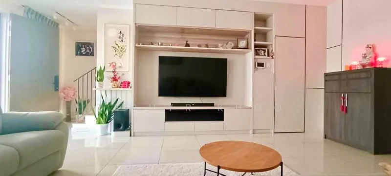 Living features: light grey leather sofa, round wooden coffee table, wall-mounted flat-screen TV, white built-in TV console with storage, decorative plants in pots, white tiled flooring, recessed lighting, framed artwork on wall, staircase in background, white walls, curtains on windows; style: modern.